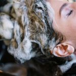 Woman Getting Her Hair Shampoo